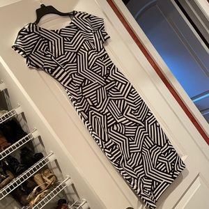 Below knee dress black and white in color